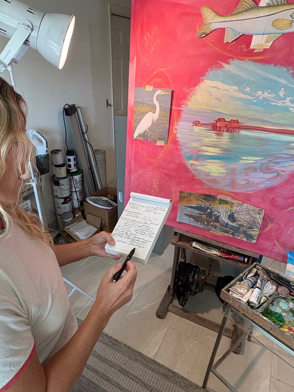 Larissa Flynn in her studio with the Naples painting in progress