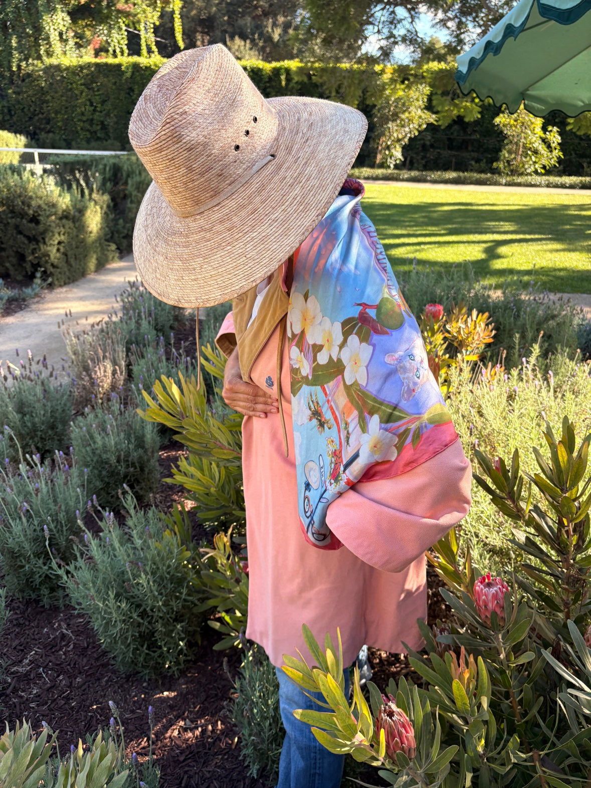 Naples silk scarf in Coral in the garden