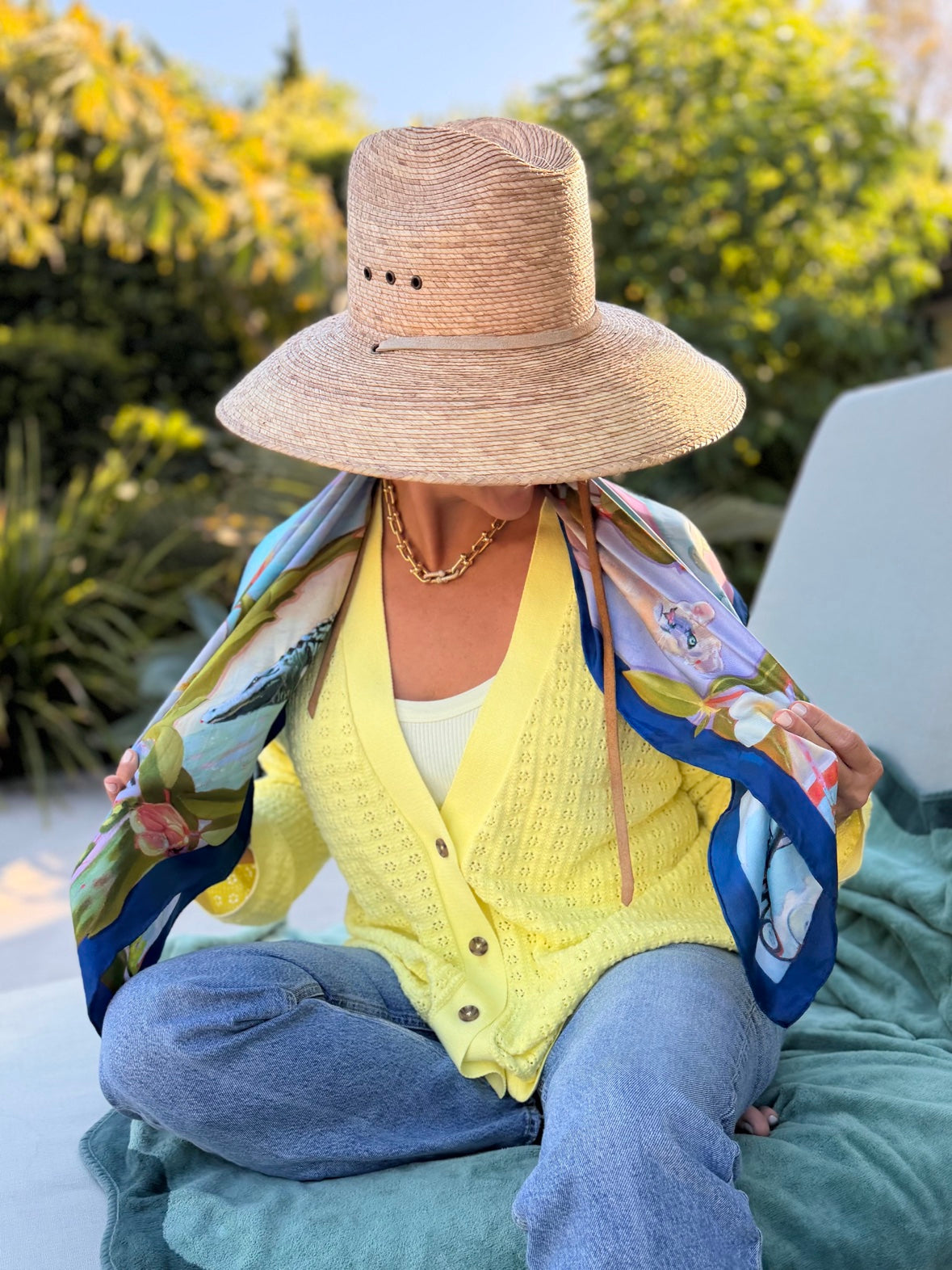 Wearing the Dock Indigo scarf with a yellow sweater