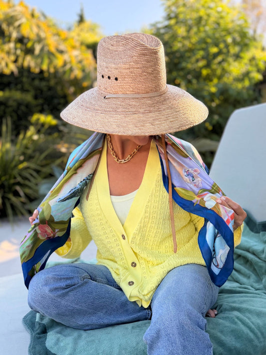 Wearing the Dock Indigo scarf with a yellow sweater
